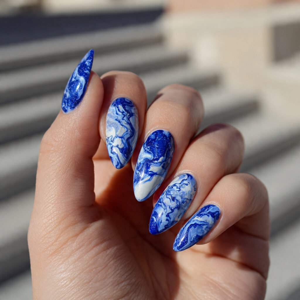 30 Fresh Bright Spring Nails Ideas to Try for a Vibrant Look 12 Intense Cobalt Blue Marbling