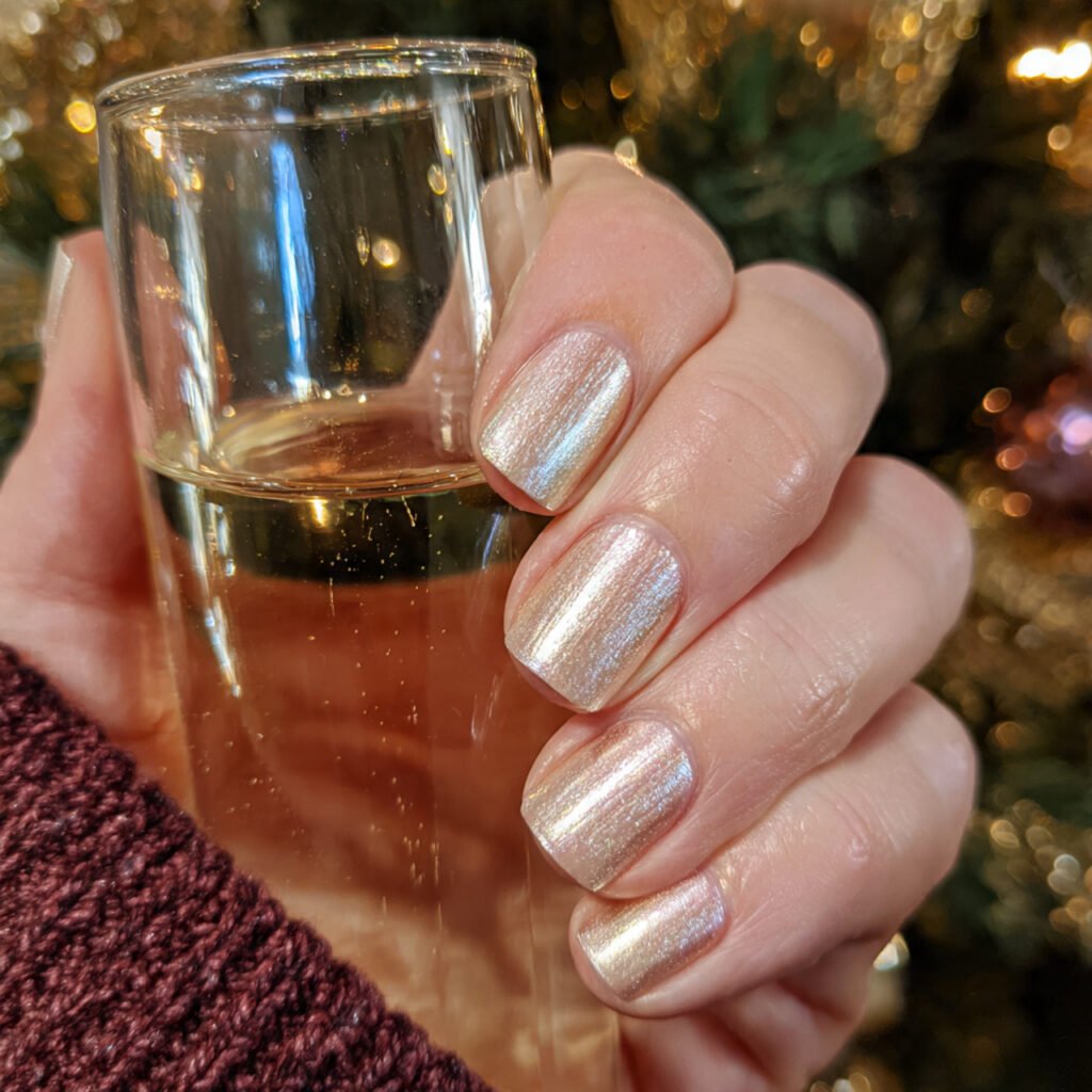 27 Best Easter Nail Ideas Short Square Designs for Spring 2026 24 Shimmering Champagne Sparkle