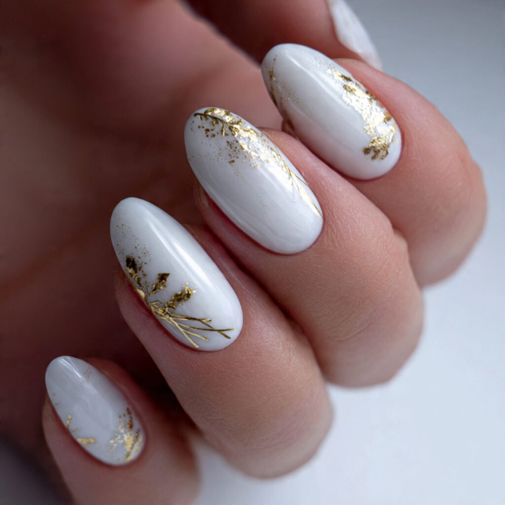 27 Holiday Nail Ideas That Will Make Your Festive Season Shine 24 White and Gold Nail Ideas