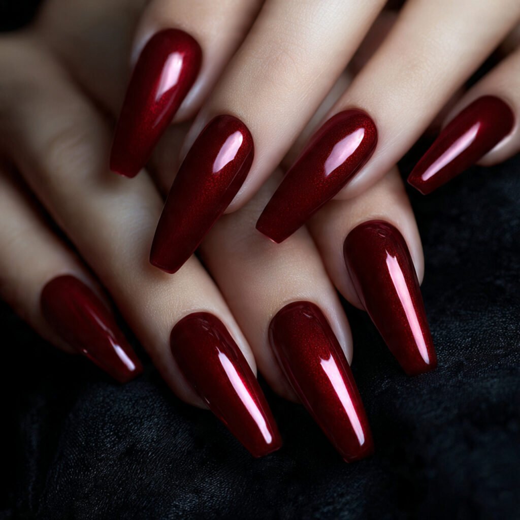 close up of hands with long coffin shaped nails de