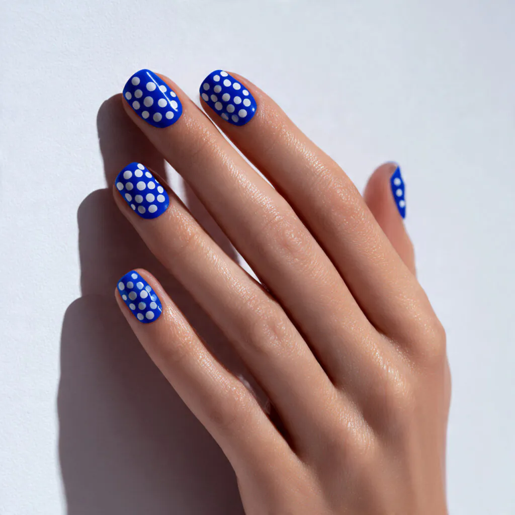 27 Modern Polka Dot Nail Ideas That Prove Dots Never Go Out of Style 18 Reverse Dot Nail Ideas
